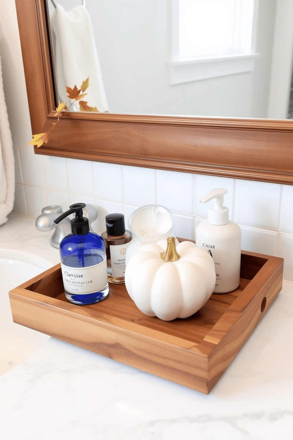 Natural wood trays elegantly display and organize essential items on a bathroom countertop. Incorporate seasonal elements like mini pumpkins and autumn leaves for a warm fall ambiance.