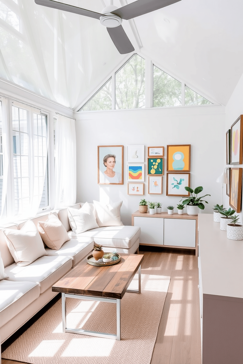 A bright and airy sunroom filled with natural light. The space features large windows with sheer white curtains that gently diffuse the sunlight. In one corner, a cozy seating area includes a plush sectional sofa adorned with pastel throw pillows. A coffee table made of reclaimed wood sits in front, with a decorative tray holding a few succulents. The walls are adorned with a gallery wall of colorful art pieces, showcasing a mix of abstract paintings and framed photographs. Below the art, a long console table displays decorative items and a few potted plants for added greenery.