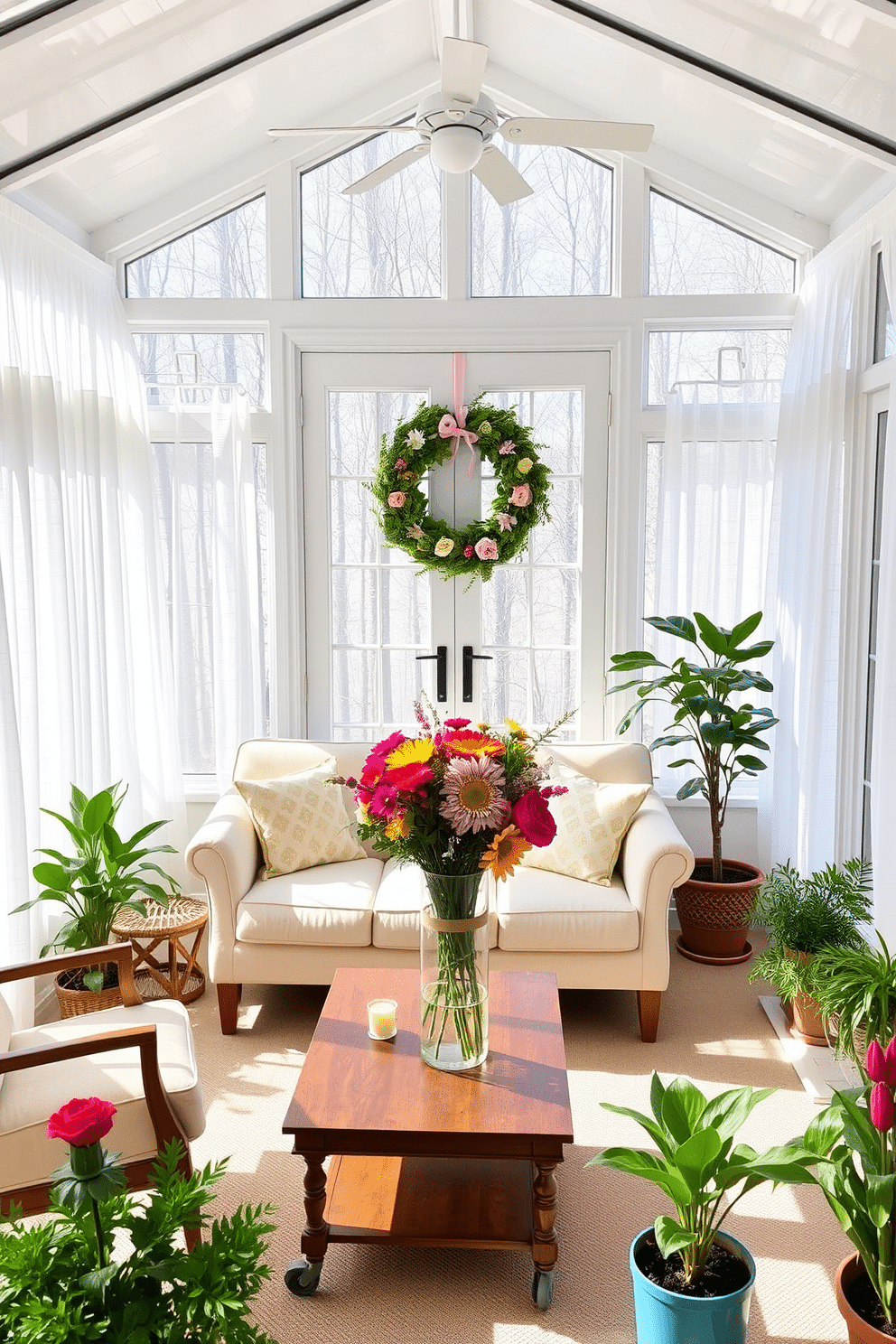 A bright and airy sunroom filled with natural light. The space features large windows adorned with sheer white curtains that gently filter the sunlight. In the center, a comfortable seating area is arranged with a pastel-colored sofa and a pair of coordinating armchairs. A cheerful spring-themed wreath, made of vibrant flowers and greenery, hangs on the door, welcoming the season. A wooden coffee table is topped with a colorful arrangement of fresh flowers in a glass vase. Potted plants in varying sizes are placed around the room, adding a touch of nature and freshness to the decor.