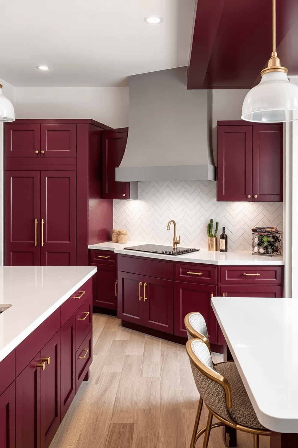 A striking kitchen design where deep burgundy lower cabinets are paired with light gray upper cabinets, creating a bold two-tone effect. The countertops are smooth white quartz, and a large kitchen island in burgundy with gold hardware serves as the centerpiece, illuminated by pendant lights with frosted glass shades above. The backsplash features a herringbone pattern in glossy white tiles, complementing the clean, modern aesthetic. A tall pantry section to the side in matching light gray balances the space, while gold bar stools with upholstered seats add an elegant touch around the island.
