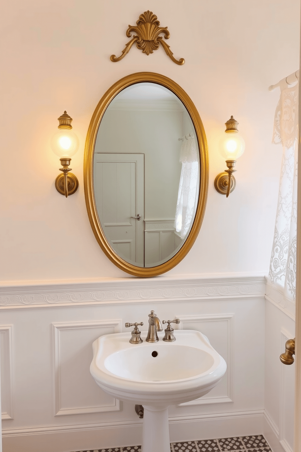A vintage-inspired bathroom with an elegant gold-framed oval mirror hanging above a porcelain pedestal sink. Two globe lights with a warm glow are mounted symmetrically on either side, casting a soft, ambient light. The walls are painted in a delicate eggshell white, complemented by intricate wainscoting for added charm. A mosaic tile floor in soft gray and cream tones enhances the retro aesthetic, while a lace-trimmed curtain softly filters natural light.